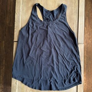 Black Lululemon tank top, either a size 10 or a 12.